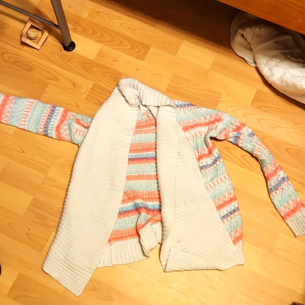 A cute pink and blue cardigan with sparkles